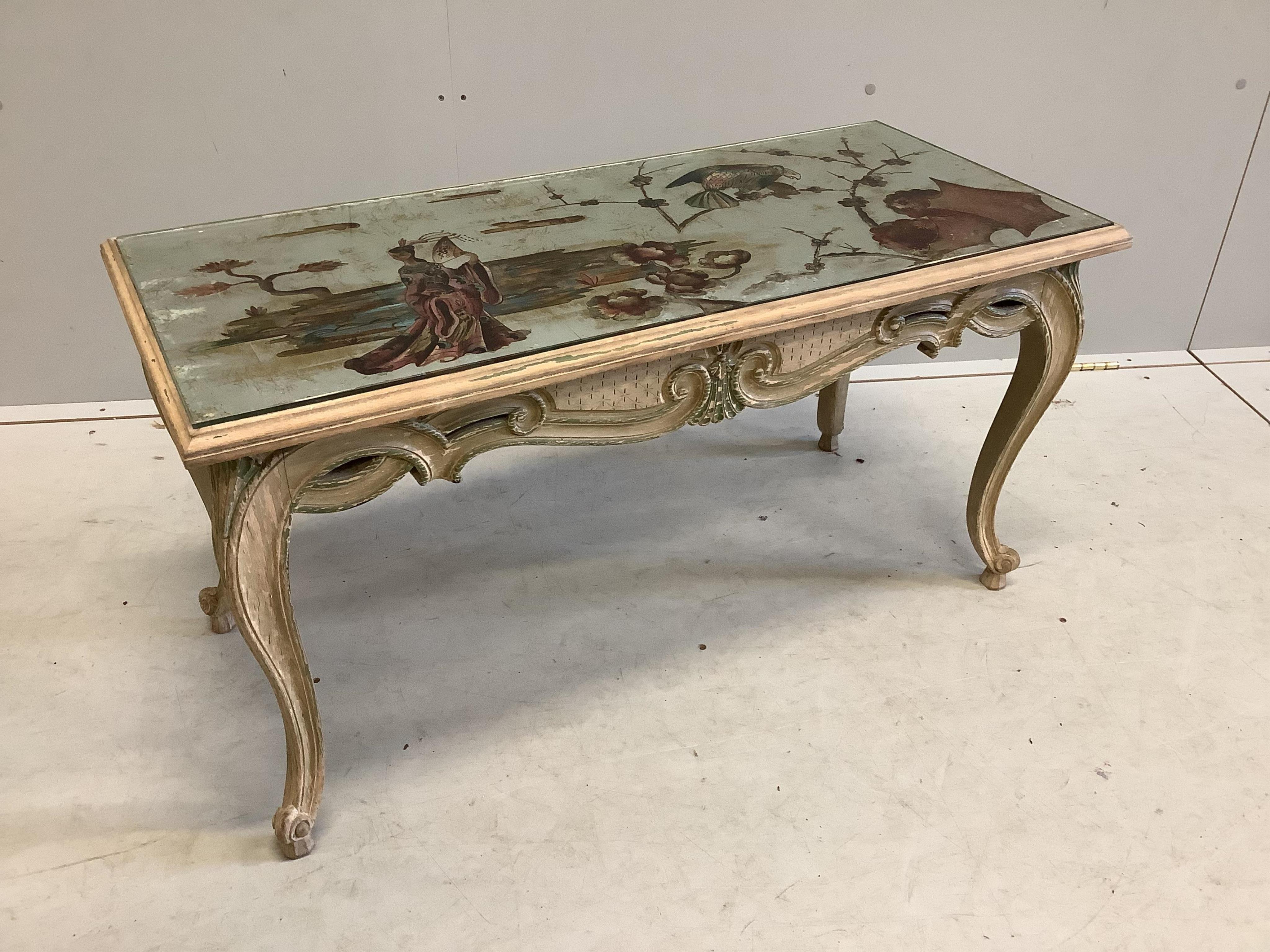 An 18th century style coffee table with reverse decorated chinoiserie top, width 93cm, depth 42cm, height 48cm. Condition - fair